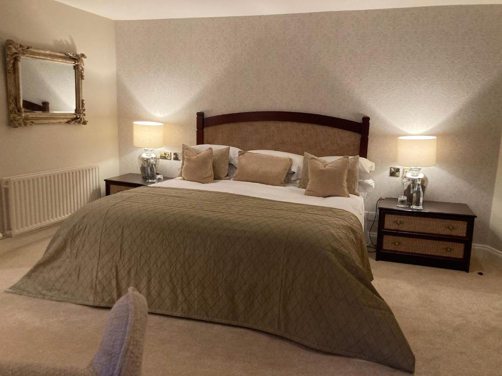 Letto o letti in una camera di Barrow Lodge