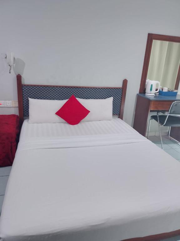 Postel nebo postele na pokoji v ubytování Highway Inn