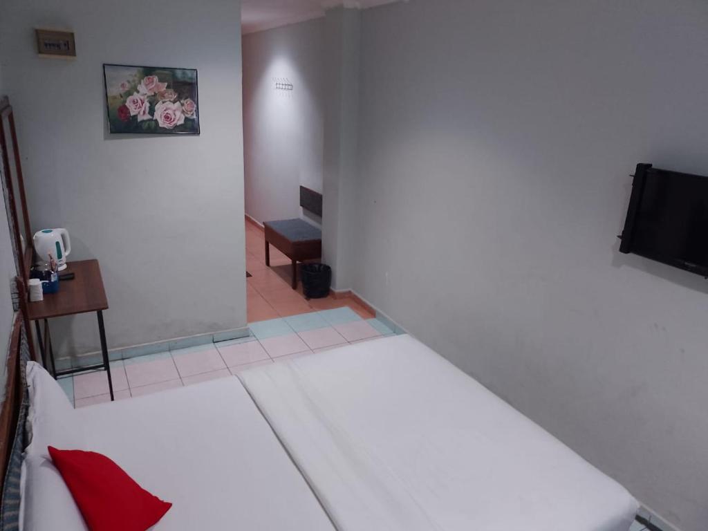 TV a/nebo společenská místnost v ubytování Highway Inn