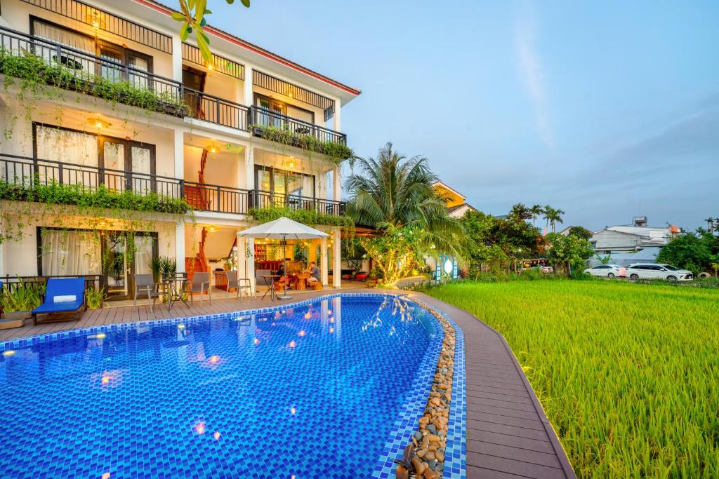 Bazén v ubytování Sunkised Paddy Hoi An Villa nebo v jeho okolí