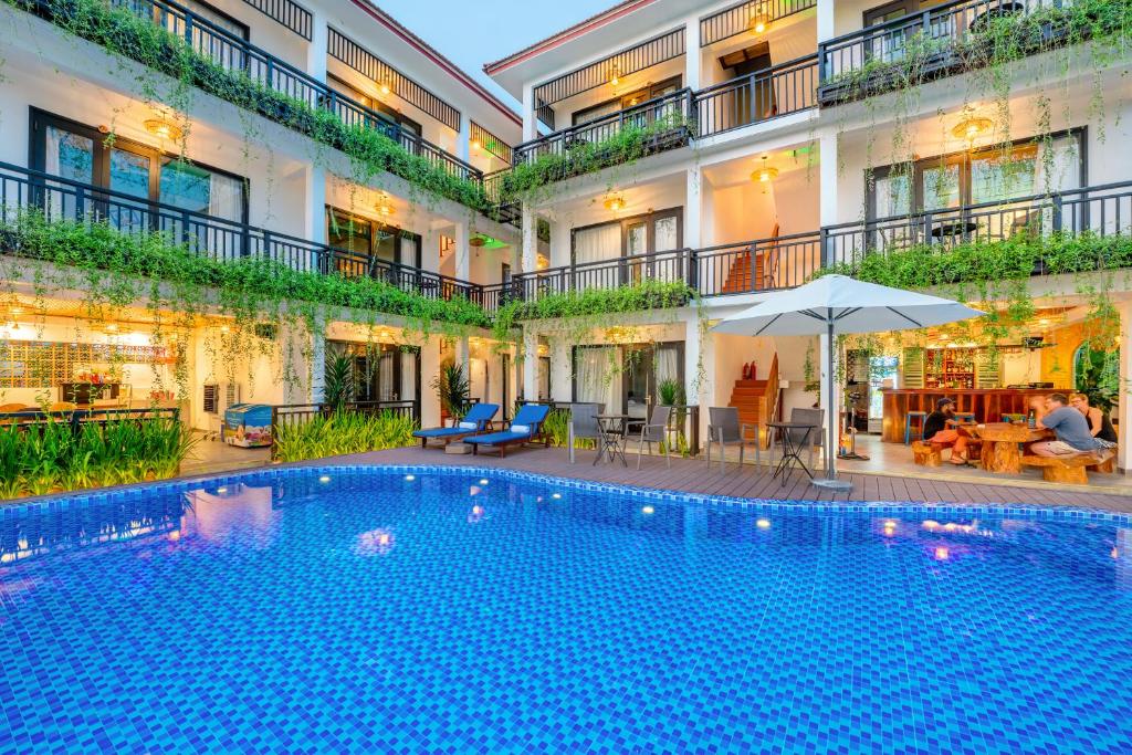 Bazén v ubytování Sunkised Paddy Hoi An Villa nebo v jeho okolí