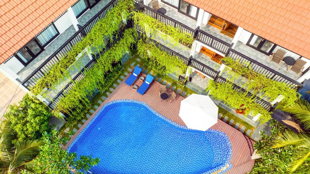Bazén v ubytování Sunkised Paddy Hoi An Villa nebo v jeho okolí