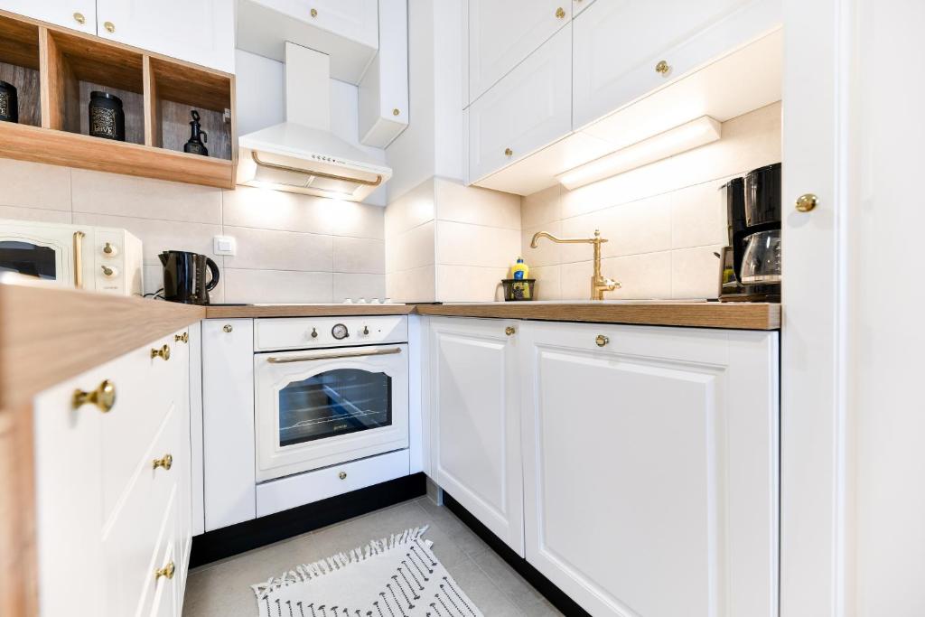 Kuchyňa alebo kuchynka v ubytovaní Lea Boutique Apartment