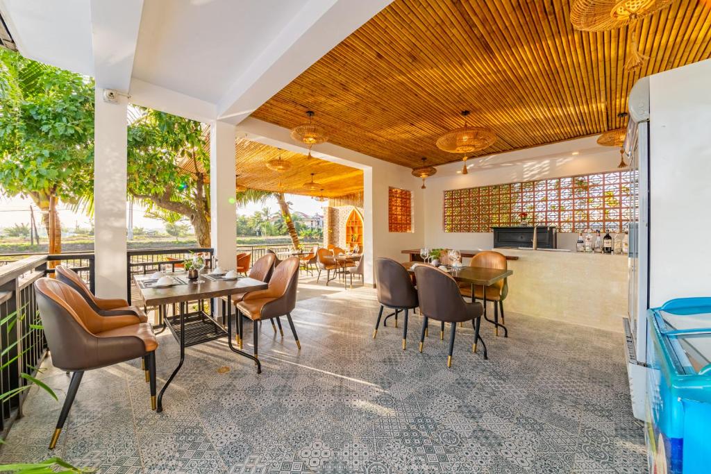Khu vực ghế ngồi tại Sunkised Paddy Hoi An Villa