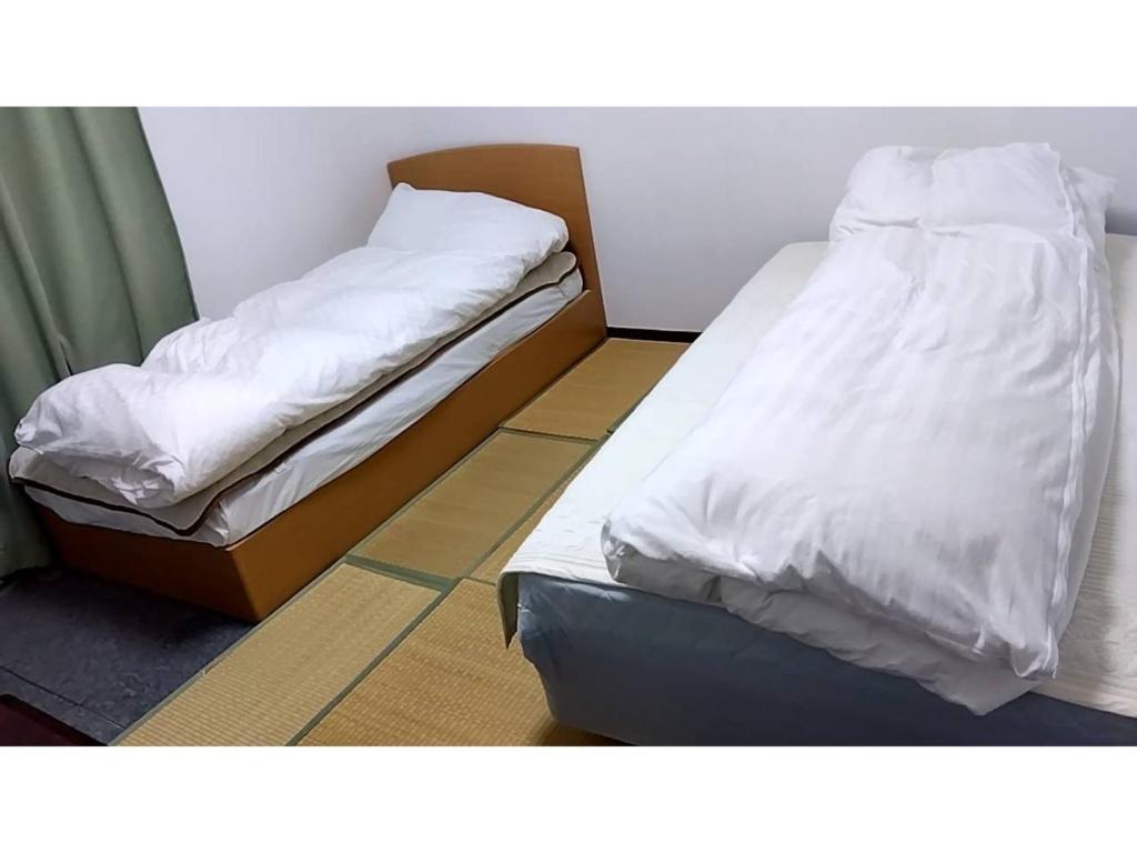 Postel nebo postele na pokoji v ubytování Kyoto - Hotel / Vacation STAY 36511