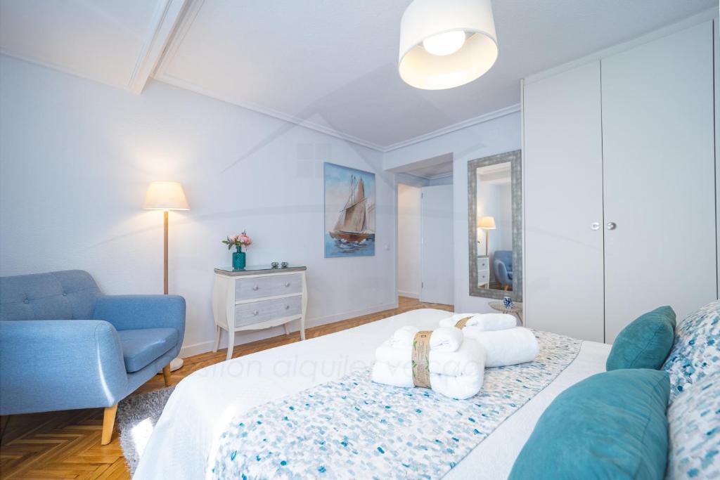Кровать или кровати в номере Playa Apartamento Frente al mar