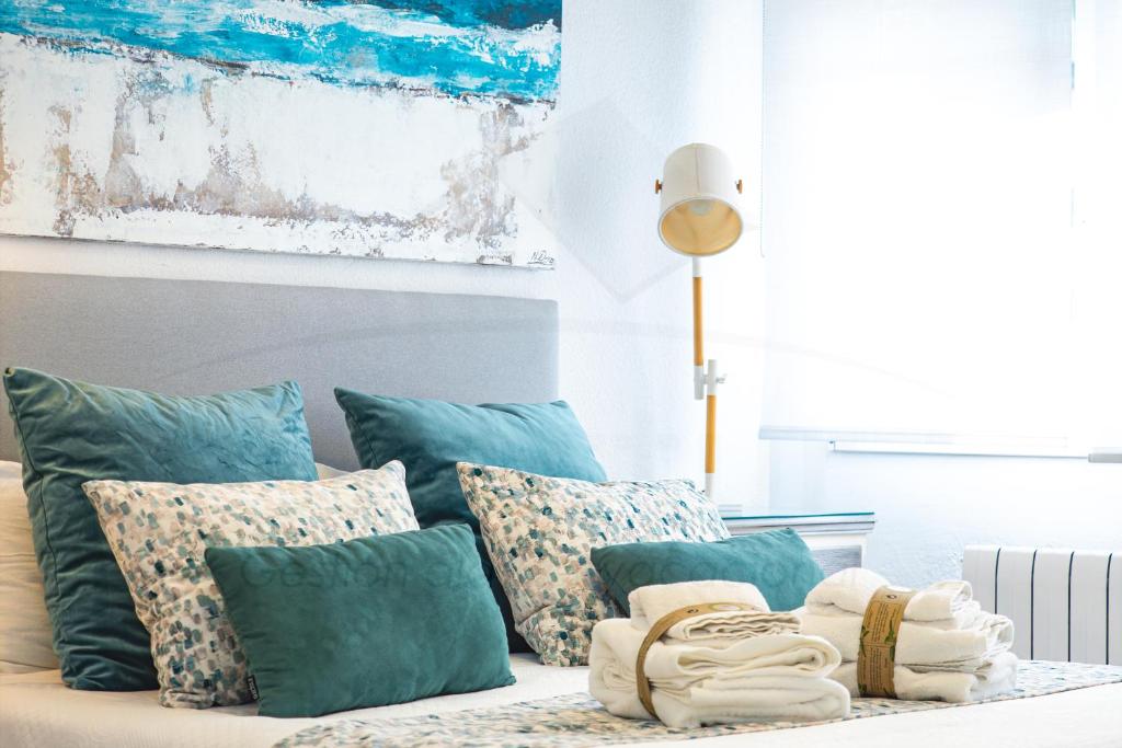 Кровать или кровати в номере Playa Apartamento Frente al mar