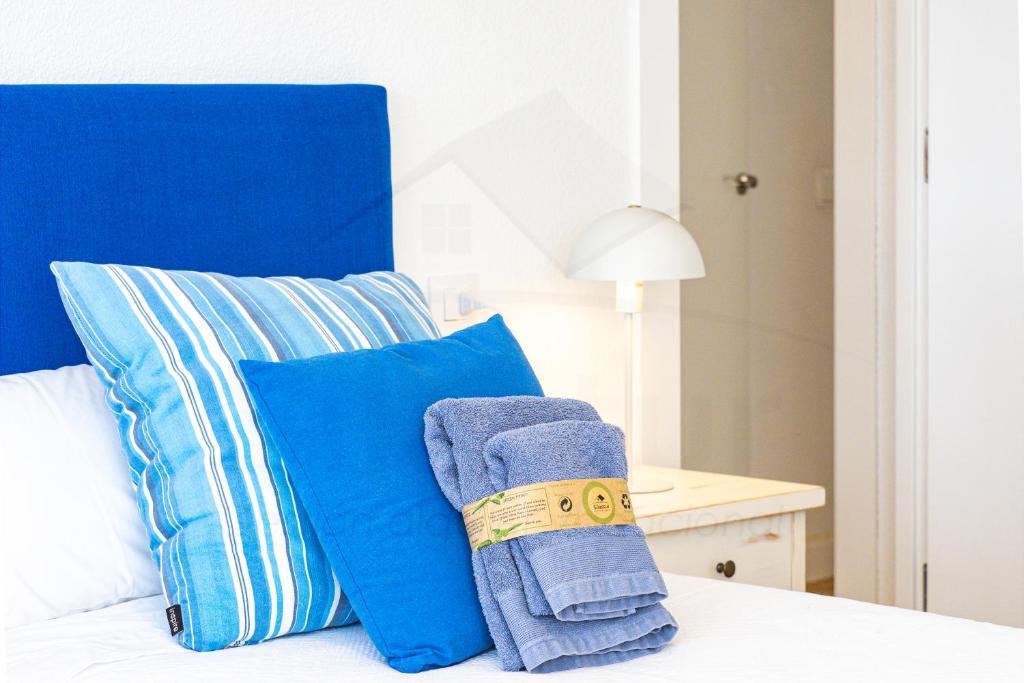 Кровать или кровати в номере Playa Apartamento Frente al mar