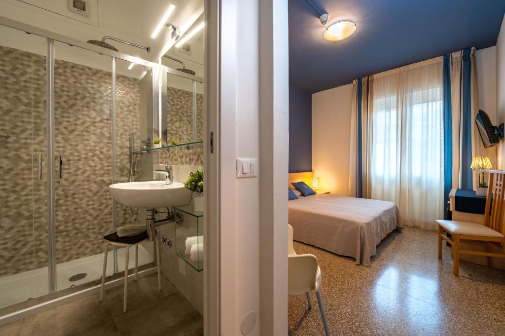 Koupelna v ubytování Hotel Doria
