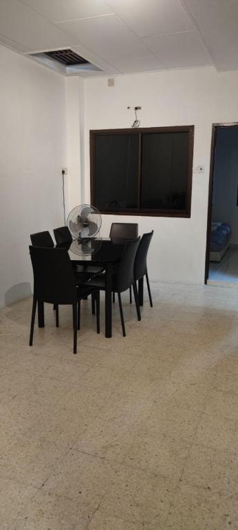 TV a/nebo společenská místnost v ubytování NTC Homestay at Parit Buntar