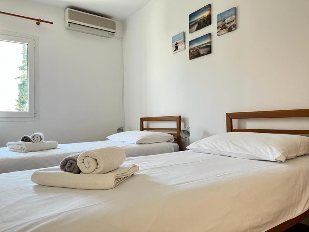 Posteľ alebo postele v izbe v ubytovaní Lemon Tree Apartments