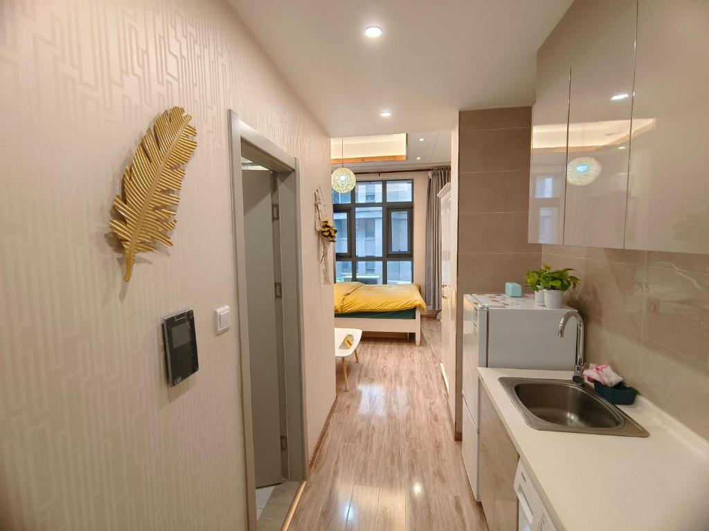 TV a/nebo společenská místnost v ubytování Yu Jing Xuan Boutique Apartment