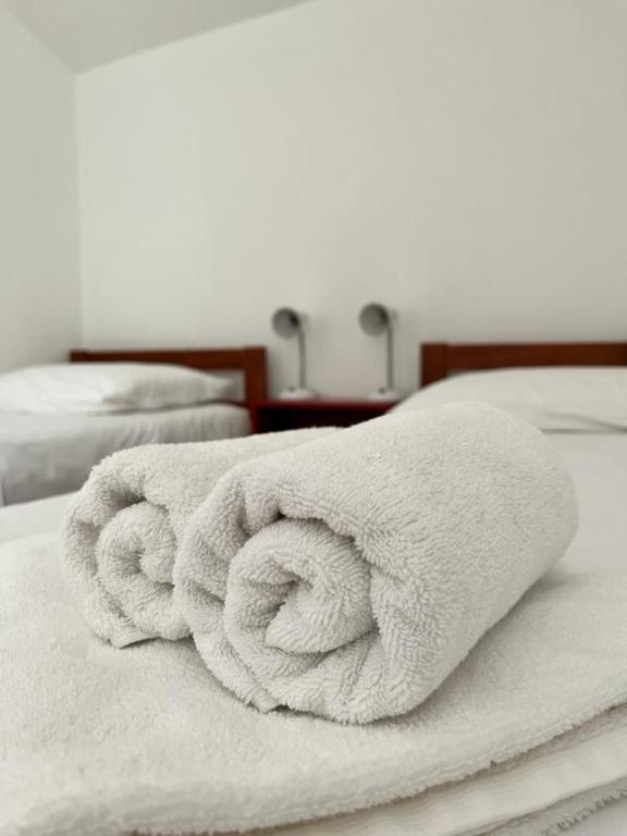 Posteľ alebo postele v izbe v ubytovaní Lemon Tree Apartments