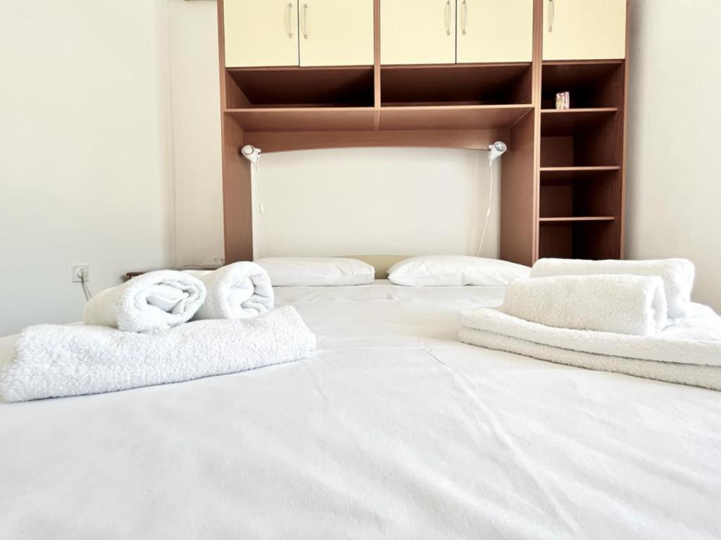 Posteľ alebo postele v izbe v ubytovaní Lemon Tree Apartments