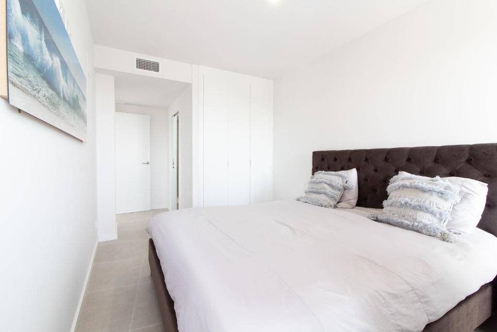 Posteľ alebo postele v izbe v ubytovaní Global Properties, Apartamento de 2 habitaciones con gran terraza en Gran Canet