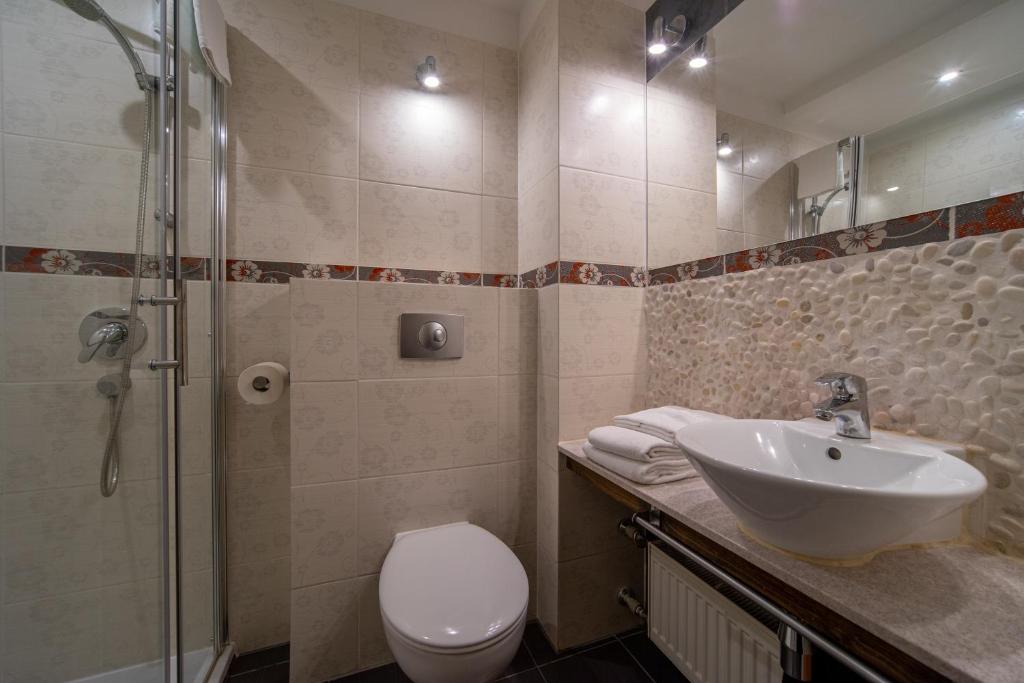 Kúpeľňa v ubytovaní Marena Wellness & Spa
