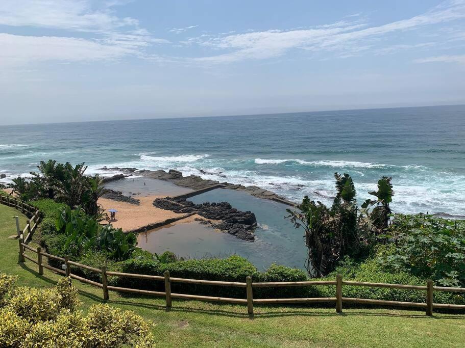 a view of the ocean from a fence at 25 Chaka's Cove in Ballito