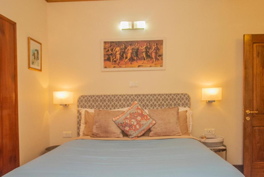 Postel nebo postele na pokoji v ubytování Amritara Luxury Villa Tosca, Gangtok