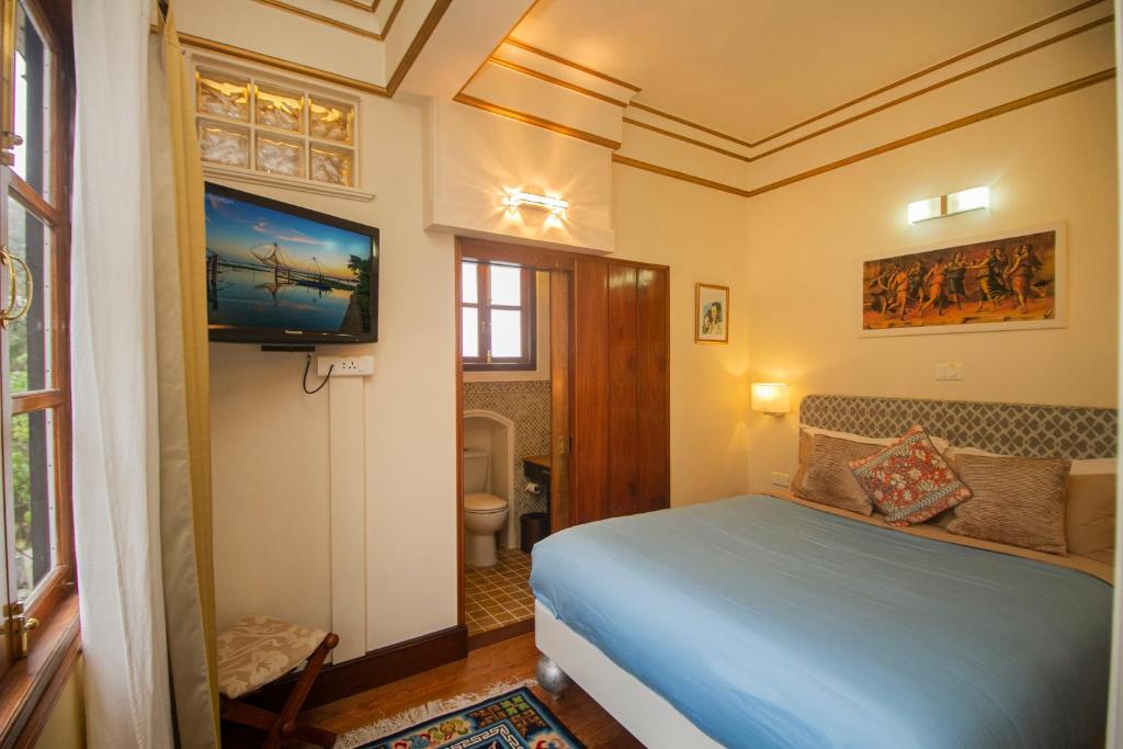 Postel nebo postele na pokoji v ubytování Amritara Luxury Villa Tosca, Gangtok