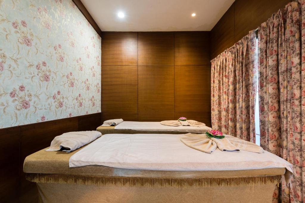 Voodi või voodid majutusasutuse The Anantmaya Resort toas