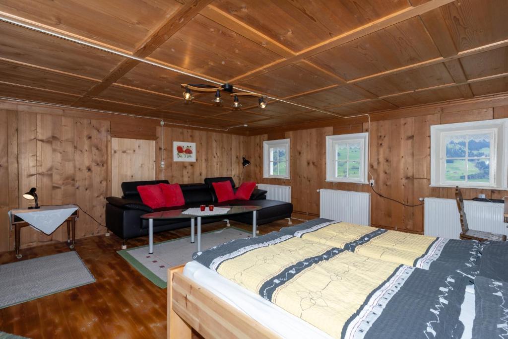 Postel nebo postele na pokoji v ubytování Haus Holzwurm