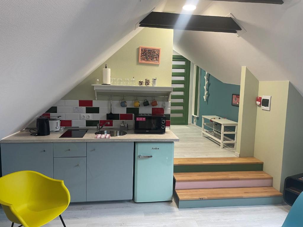 Kuchyň nebo kuchyňský kout v ubytování Dunakavics XIII Apartman