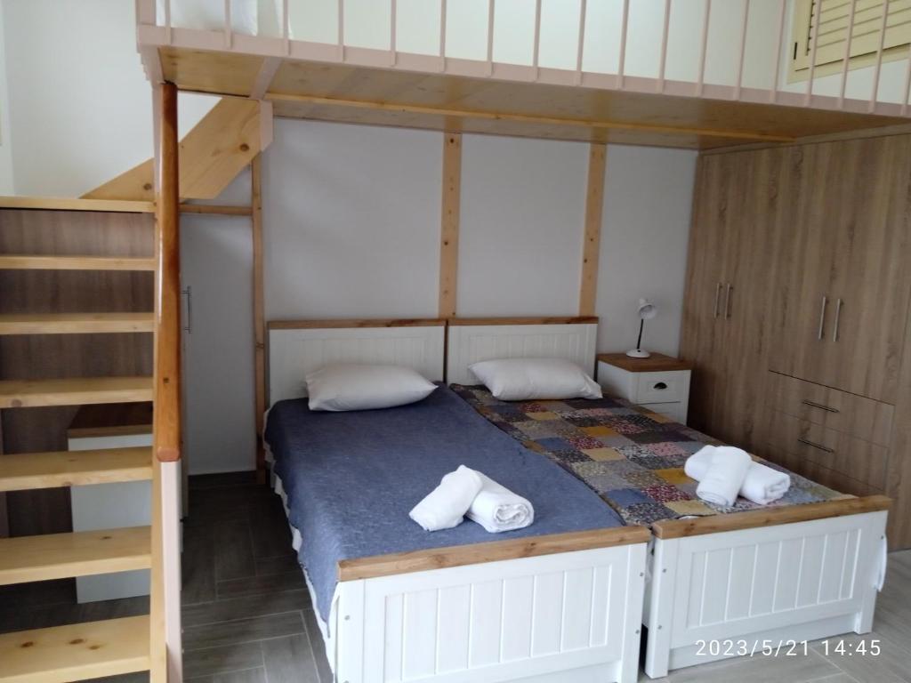 Postel nebo postele na pokoji v ubytování Evoikos beach & resort