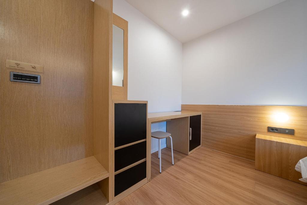 Postel nebo postele na pokoji v ubytování Aank Hotel Daejeon Yongjeon 2nd