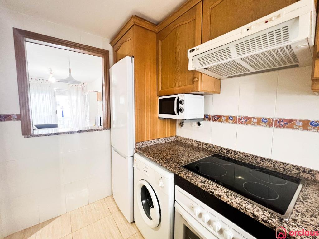 Kuchyň nebo kuchyňský kout v ubytování Céntrico y renovado