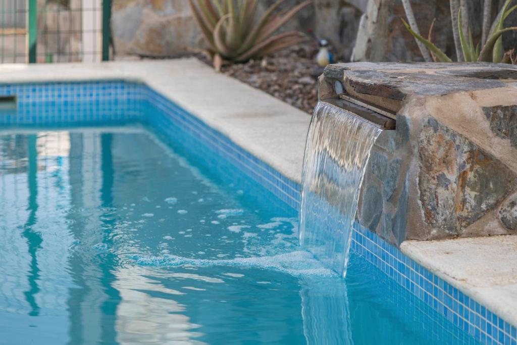 Bazén v ubytování La Casita Azul - Mayores de 25 nebo v jeho okolí