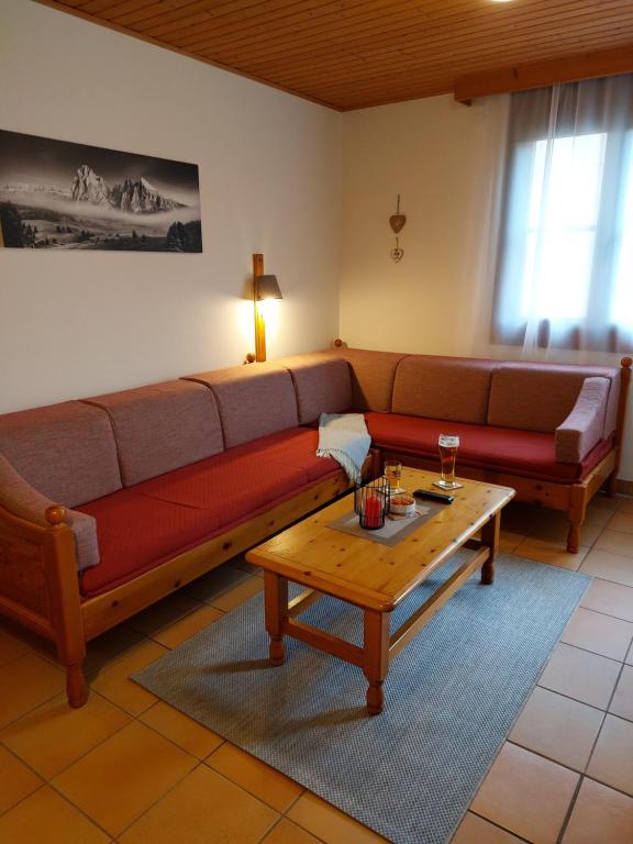 Posezení v ubytování Apartment Gerlitzen Garden