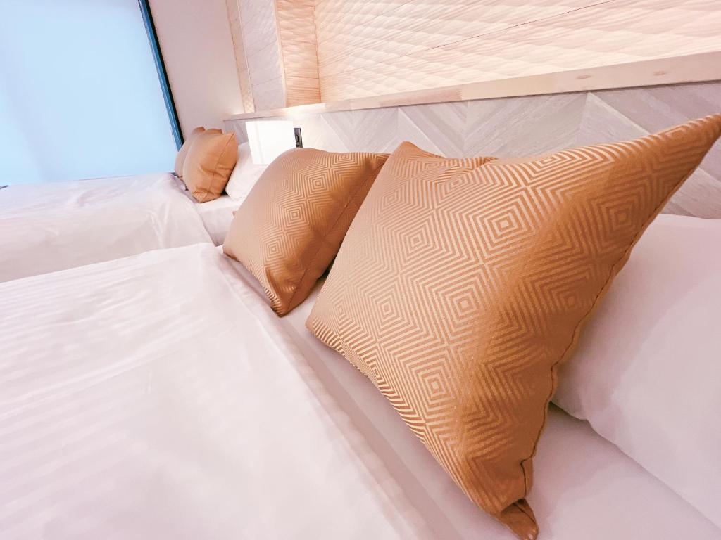 Postel nebo postele na pokoji v ubytování FELIZ ARIFUKU ONSEN