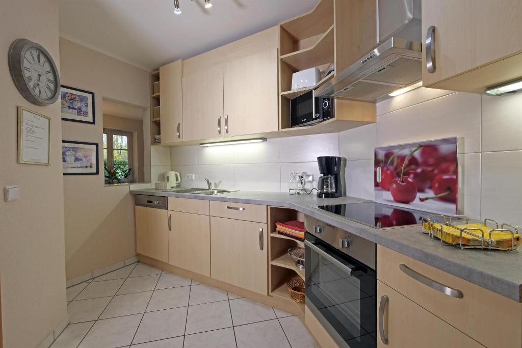 Kuchyň nebo kuchyňský kout v ubytování Ferienwohnung Villa Waldesruh