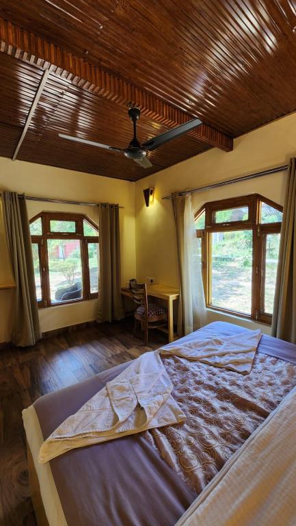 Postel nebo postele na pokoji v ubytování Namlang Resort