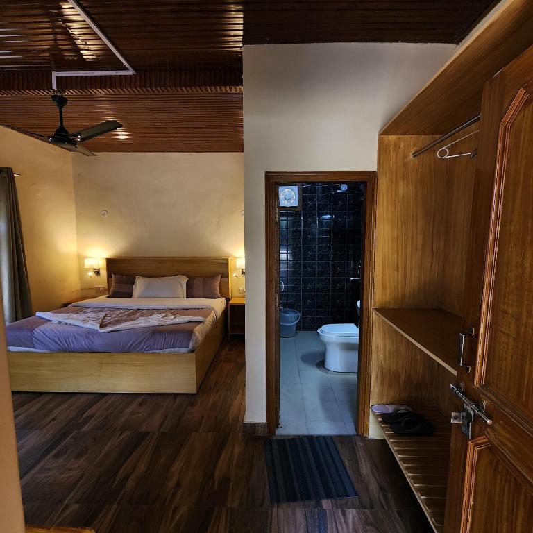 Postel nebo postele na pokoji v ubytování Namlang Resort