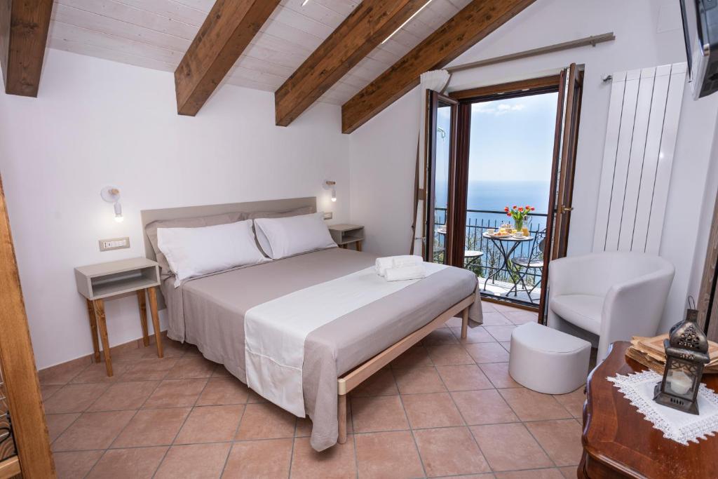 Postel nebo postele na pokoji v ubytování Agriturismo Punta San Lazzaro
