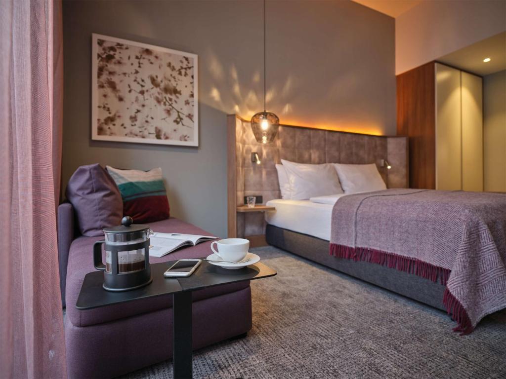 Postel nebo postele na pokoji v ubytování Adina Apartment Hotel Nuremberg