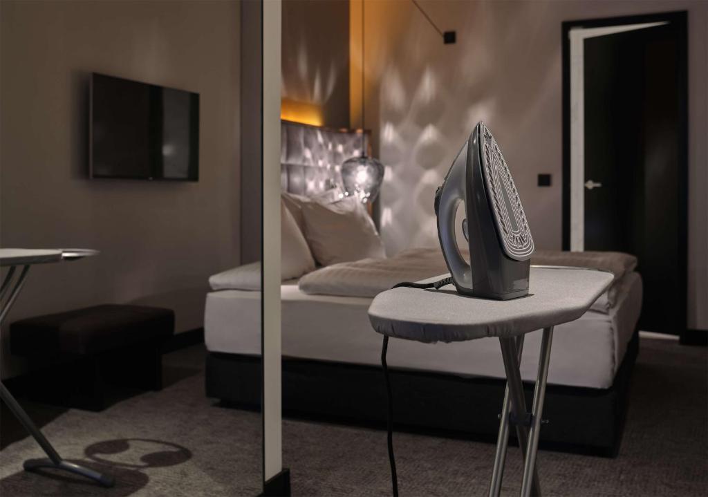 TV a/nebo společenská místnost v ubytování Adina Apartment Hotel Nuremberg