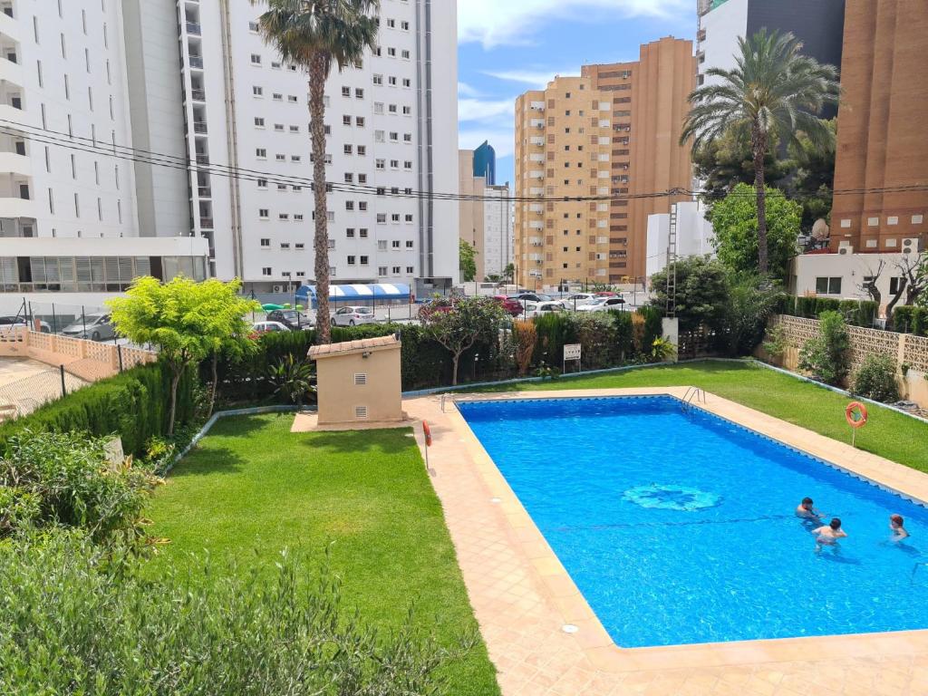 Bazén v ubytování Apartamento Edificio Acacias IV -15 nebo v jeho okolí