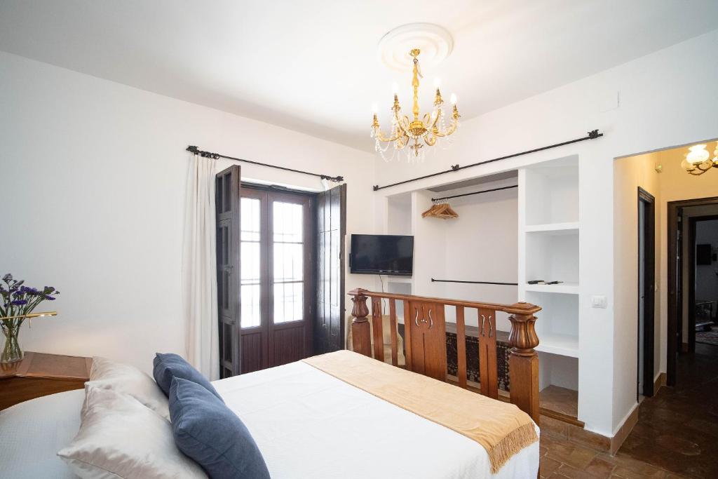 Televízia a/alebo spoločenská miestnosť v ubytovaní La Casa 1832 Boutique
