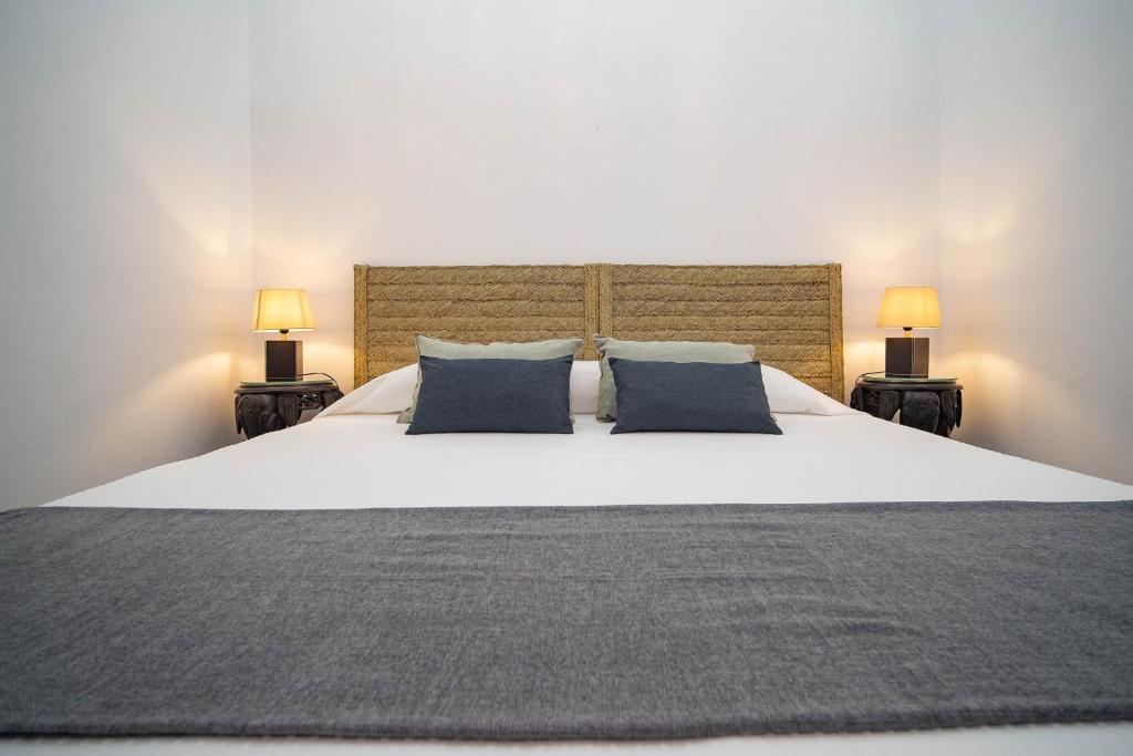 Posteľ alebo postele v izbe v ubytovaní La Casa 1832 Boutique