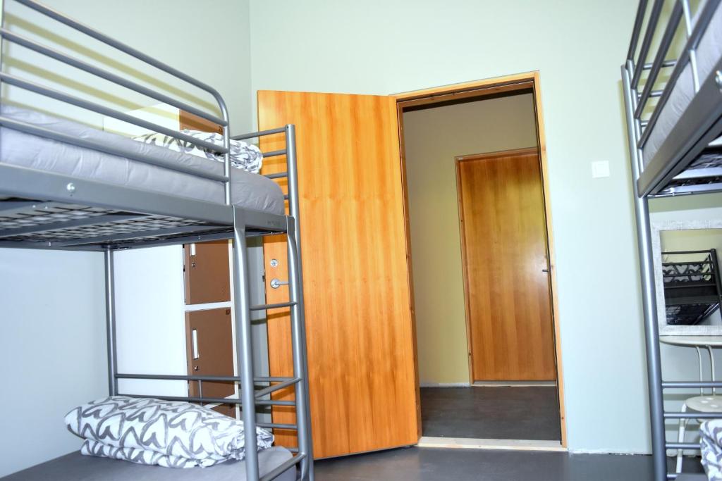 Postel nebo postele na pokoji v ubytování Bla Bla Hostel