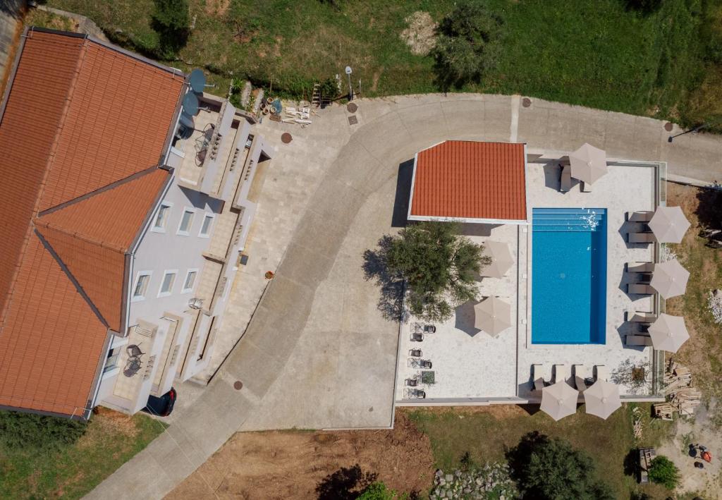 Bazén v ubytování Djukanovic Apartments nebo v jeho okolí
