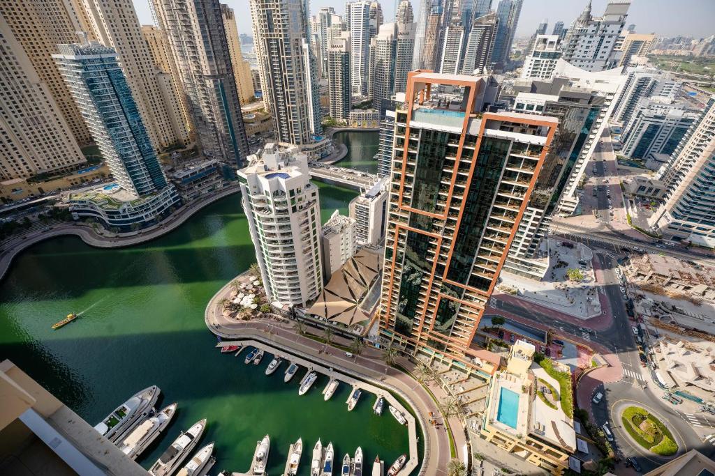 an aerial view of a city with tall buildings at The Address Dubai Marina in Dubai
