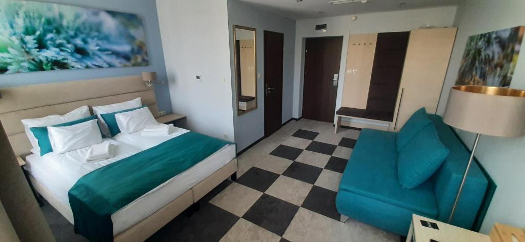 Postel nebo postele na pokoji v ubytování Inter Hotel
