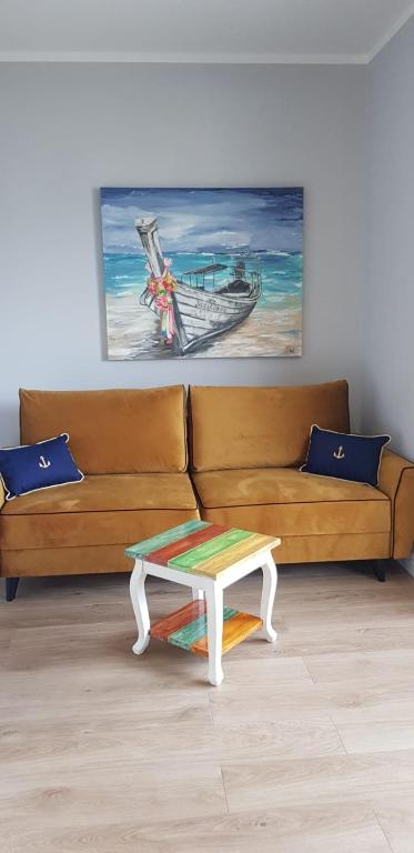 Część wypoczynkowa w obiekcie Uroczy Apartament Happy 01 z widokowym tarasen na dachu - tuż przy plaży !!!