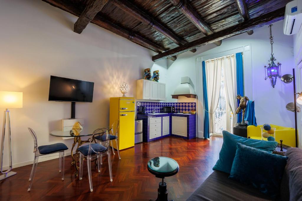 TV a/nebo společenská místnost v ubytování Bellini Inn Primo Piano