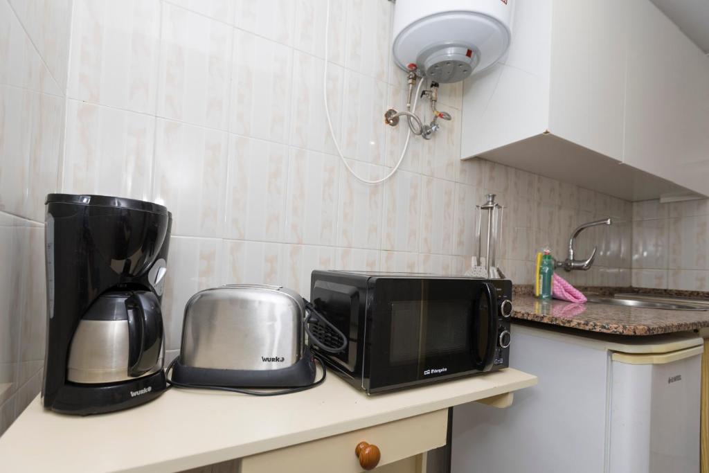 Kuchyň nebo kuchyňský kout v ubytování Hotel LIVVO Veril Playa