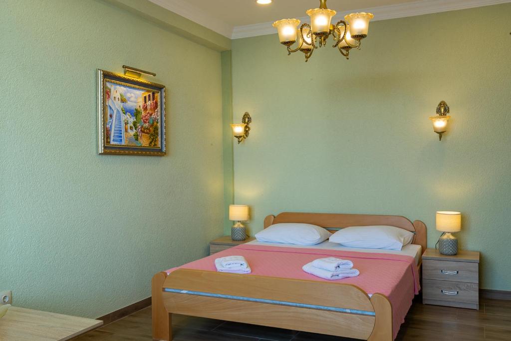 Postel nebo postele na pokoji v ubytování DreamSea Apartment