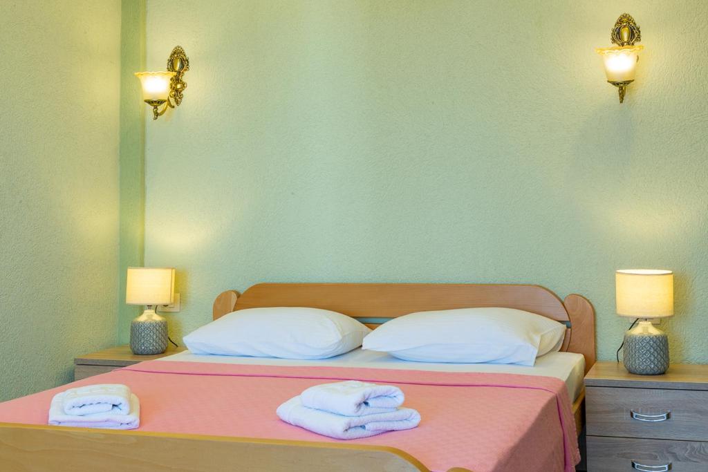 Postel nebo postele na pokoji v ubytování DreamSea Apartment